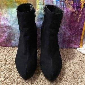 Black suede high heeled booties